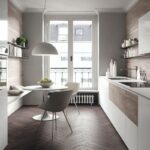 Cucine italiane bianche e legno foto Valcucine|Cucine italiane bianche e legno foto|pareti in legno moderne|Cucine bianca e legno foto Scavolini|Cucine bianca e legno foto Snaidero